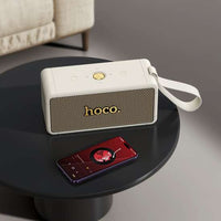 HOCO. HT1 Max Wireless Sports 40W Portable Speaker – Premium Sound (Supports TF, USB, AUX) – White & Black - Saif Al Najmi KwWireless SpeakersHocoSaif Al Najmi KwWhiteHOCO. HT1 Max Wireless Sports 40W Portable Speaker – Premium Sound (Supports TF, USB, AUX) – White & Black